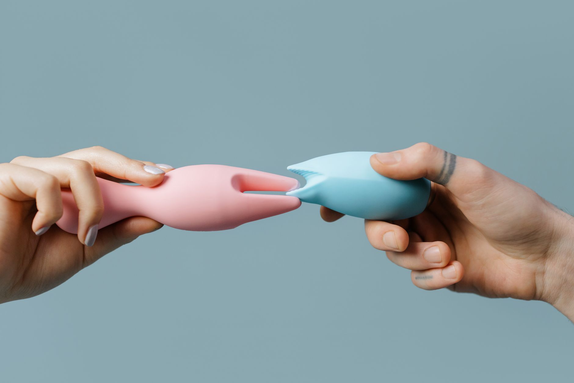 Vibrant collection of colorful clitoral vibrators and toys on display