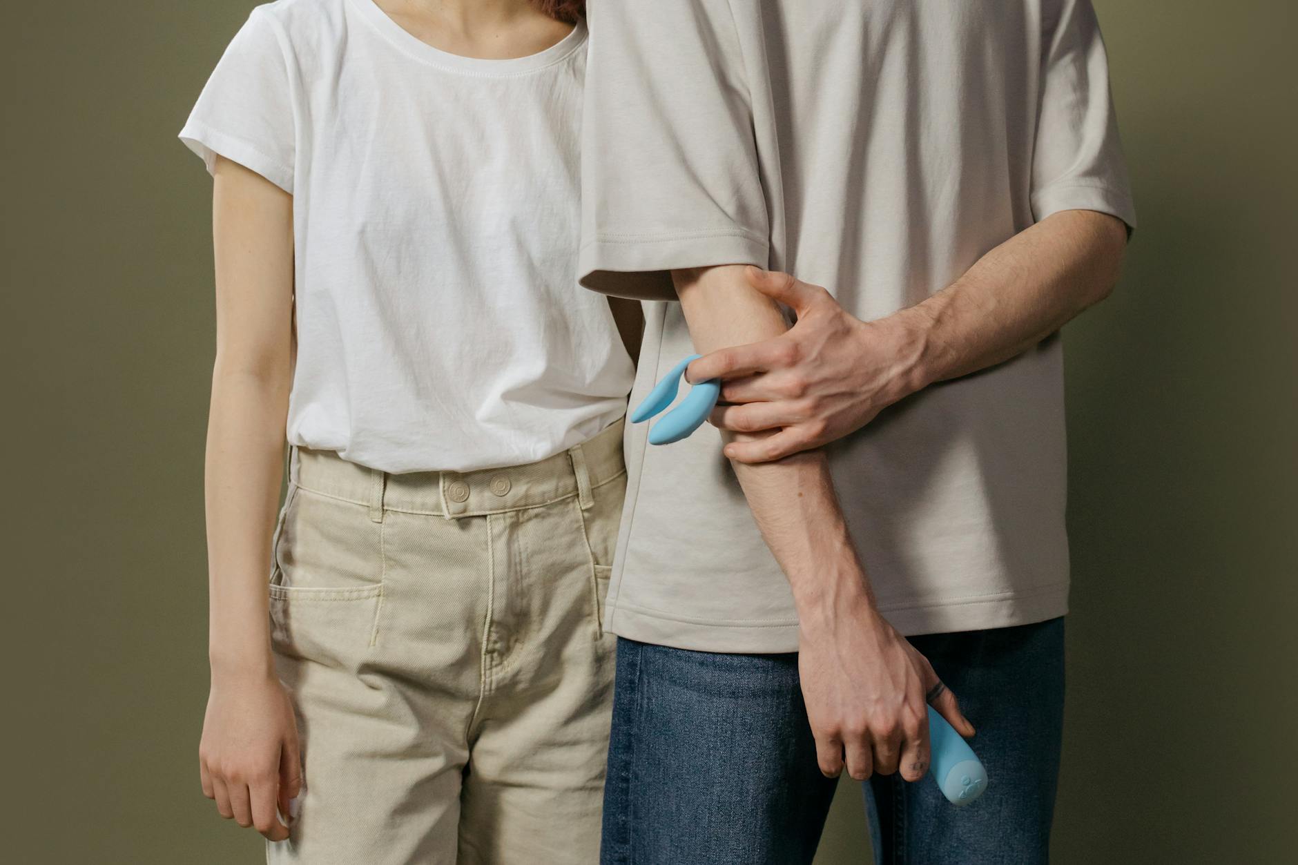 A couple exploring intimacy together with a modern clitoral vibrator, representing partnership and connection.